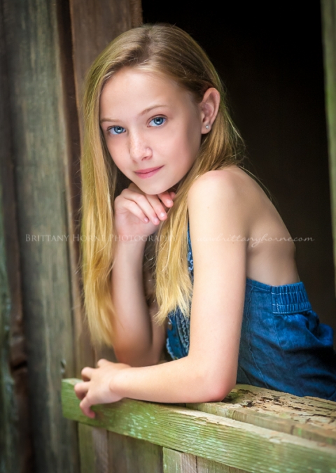 Children Photography blonde girl in barn window Creative Edge Photography Workshops Photography Class Atlanta